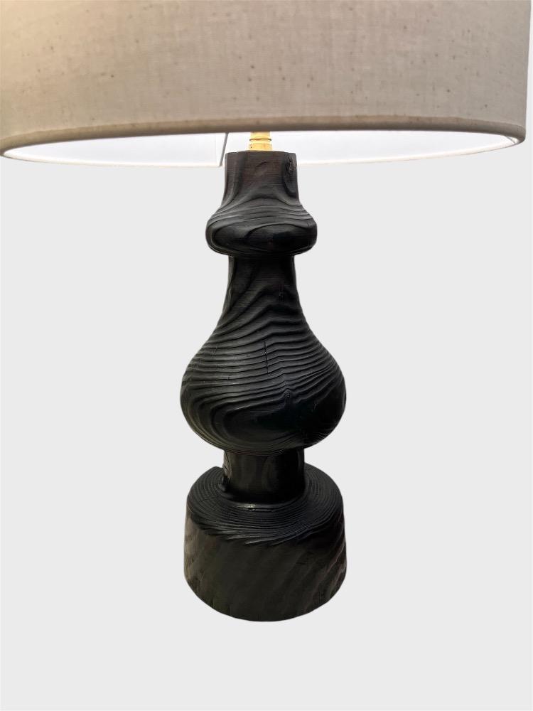 Set of 3 dark burnt pine table lamps. Circa 1970.